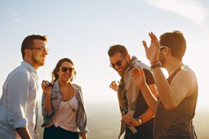 group of people having fun together under the sun 708392